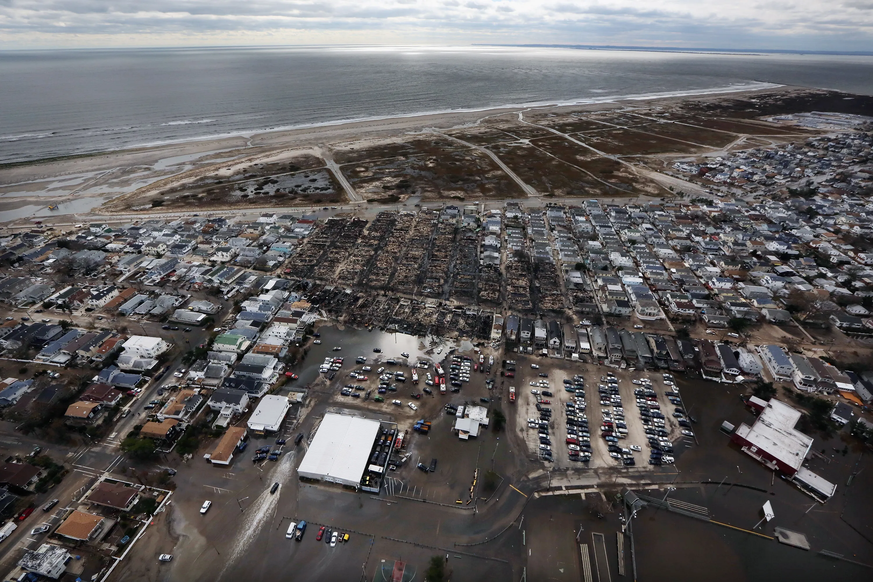 The remains of homes amid flood water after Superstorm Sandy in the Queens borough of New York in 2012.