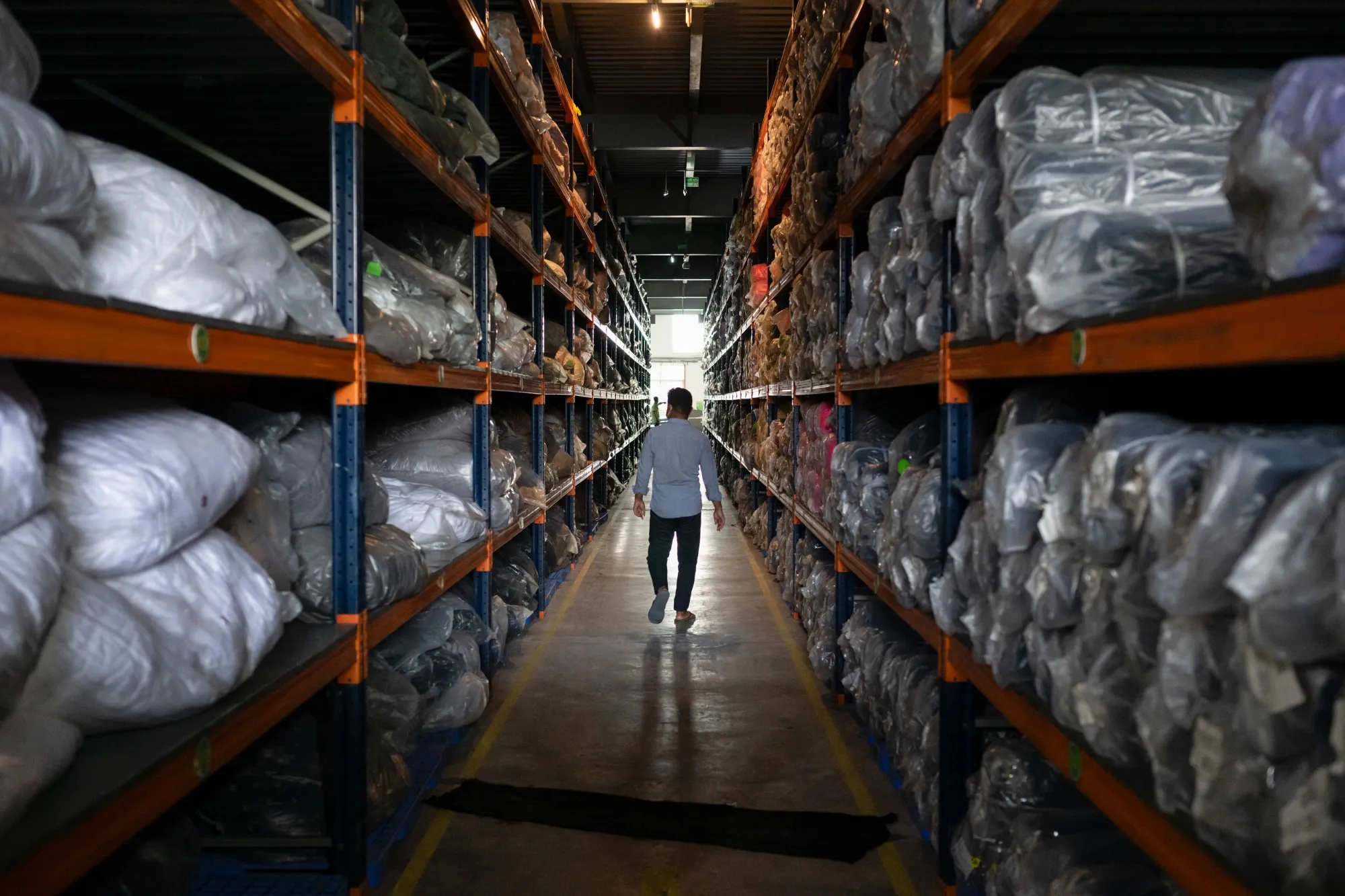 Raw materials stacked in a warehouse inside a garment factory in Narayanganj, Bangladesh.