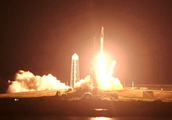 SpaceX Flies ISS Crew in First Trip on Used Capsule, Rocket
