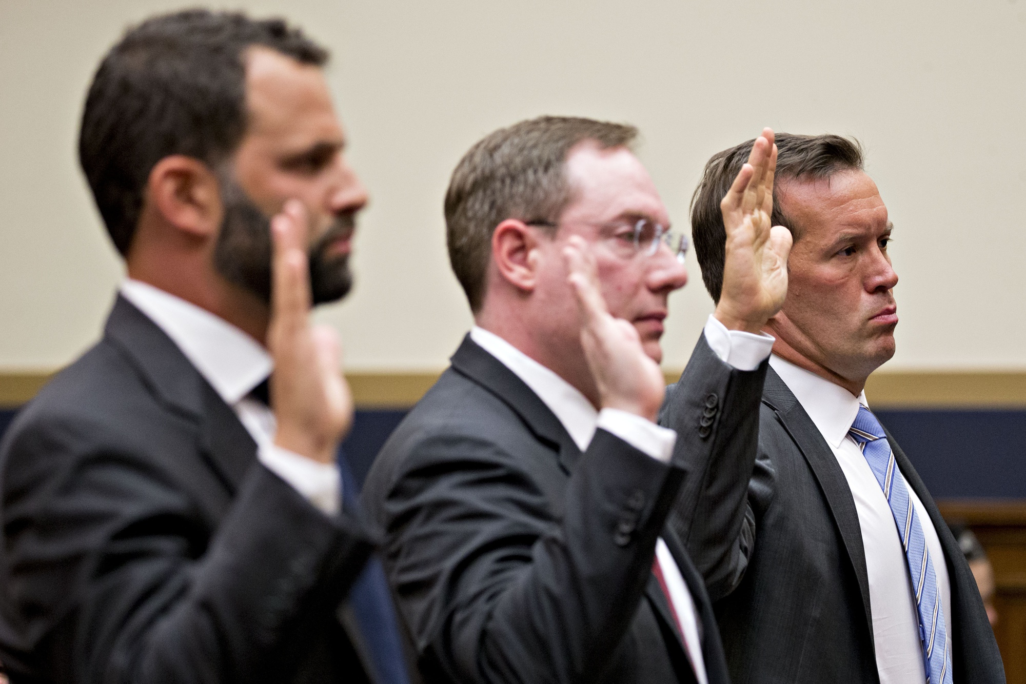 From left, Facebook's Matt Perault, Amazon's Nate Sutton, and Apple's Kyle Andeer, swear in to a House Judiciary Subcommittee on Antitrust hearing in Washington, D.C., on July 16.