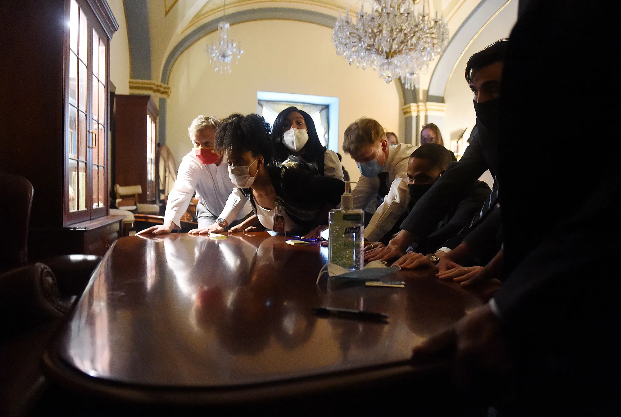 Congress staffers barricade a room after Trump supporters stormed the U.S. Capitol on Jan. 6.