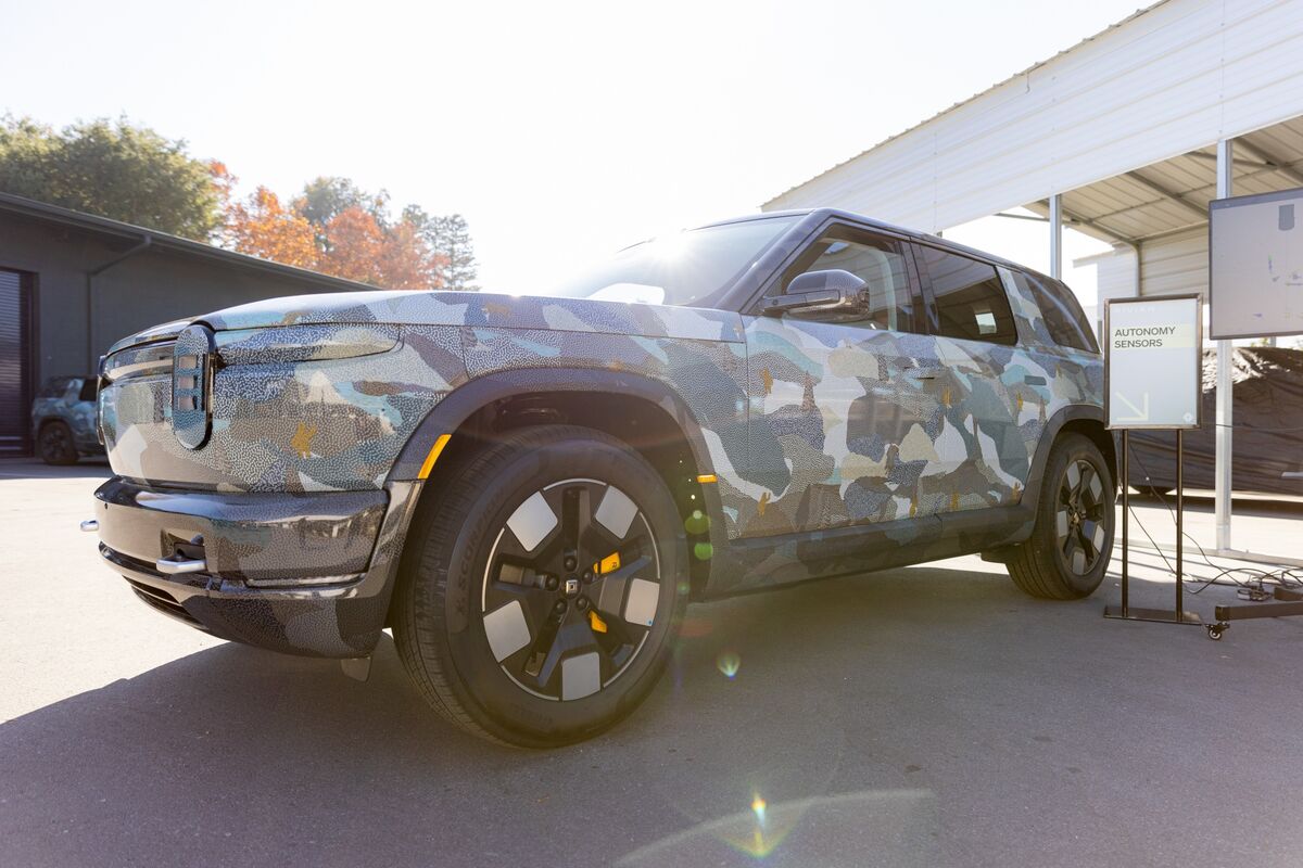 bloomberg.com - Kara Carlson - Rivian Boosts Delivery Outlook as Next-Generation EV Sales Begin