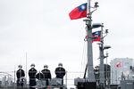 Soldiers stand onboard a Taiwan Navy minelayer in Keelung, Taiwan, on Friday, Jan. 7, 2022.