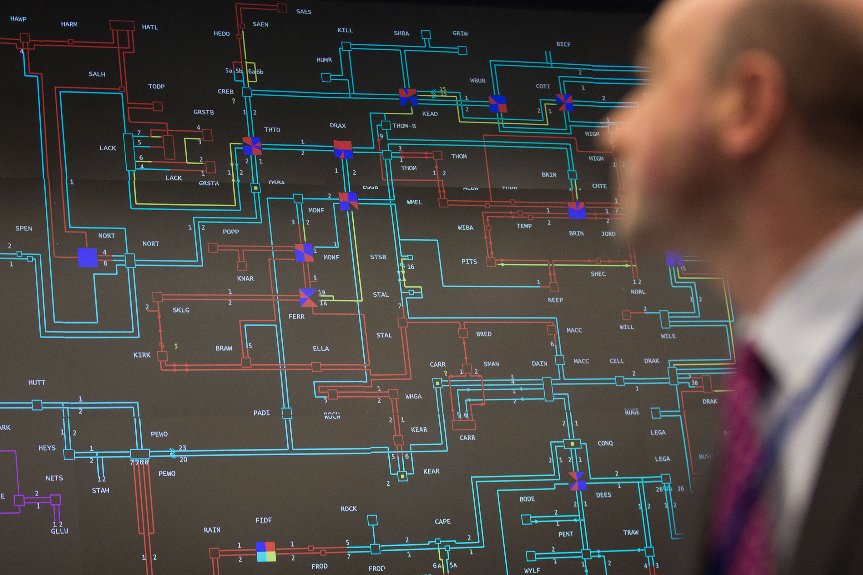 An employee monitors output at the National Grid Plc.&nbsp;