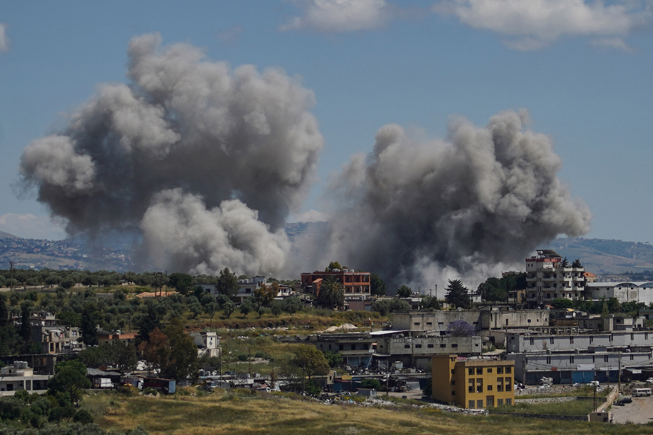 Smoke rises following an Israeli strike on the southern village of Nabatieh, Lebanon, on May 24, 2026. Photographer: Abbas Fakih/AFP/Getty Images
