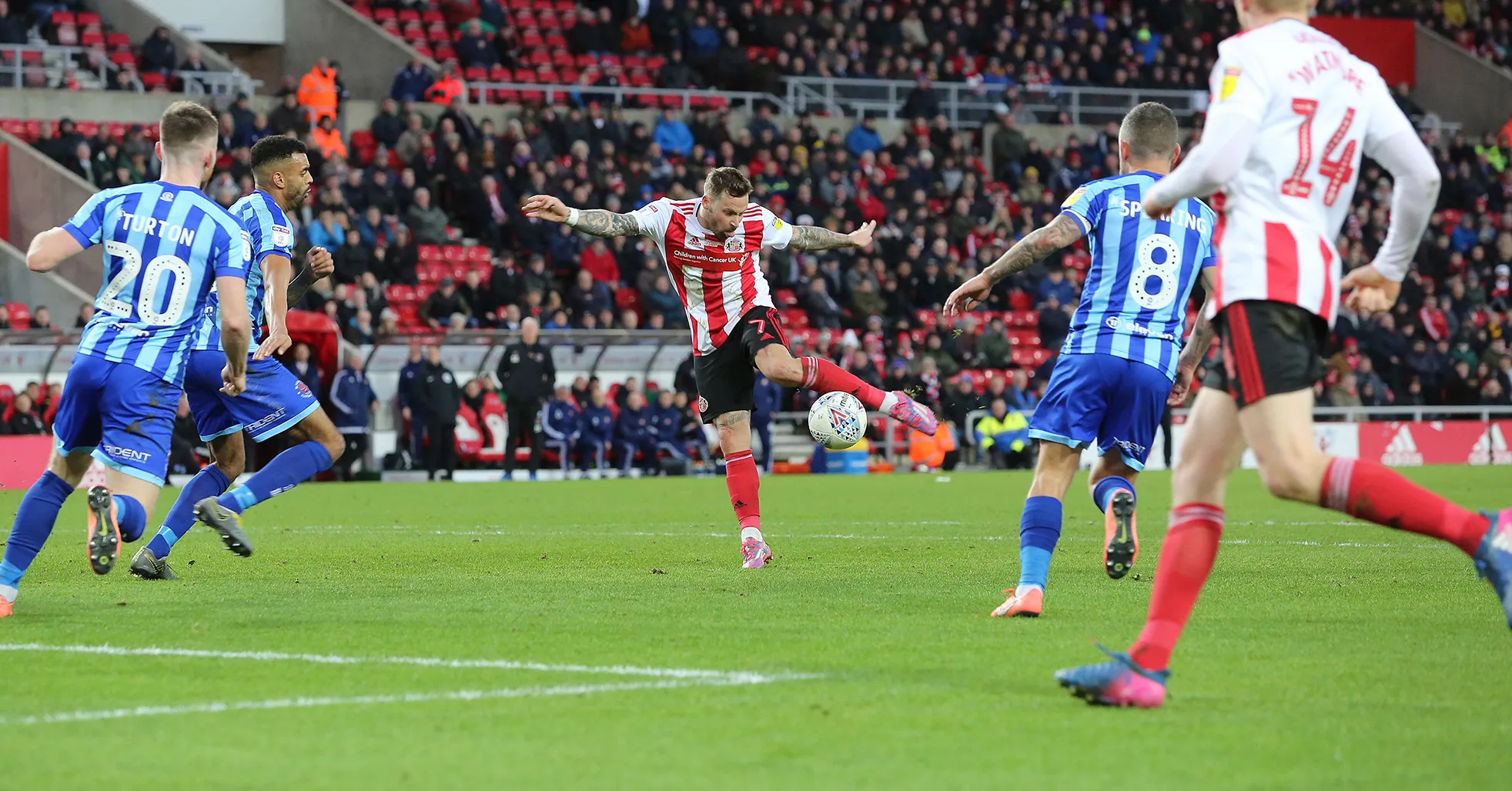 Chris Maguire of Sunderland (C) strikes at goal during the Sky Bet Leauge One match between Sunderland and Blackpool at Stadium of Light on December 14, 2019 in Sunderland, England.