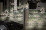 Logo decals pass through a labeling machine at the Heineken NV brewery