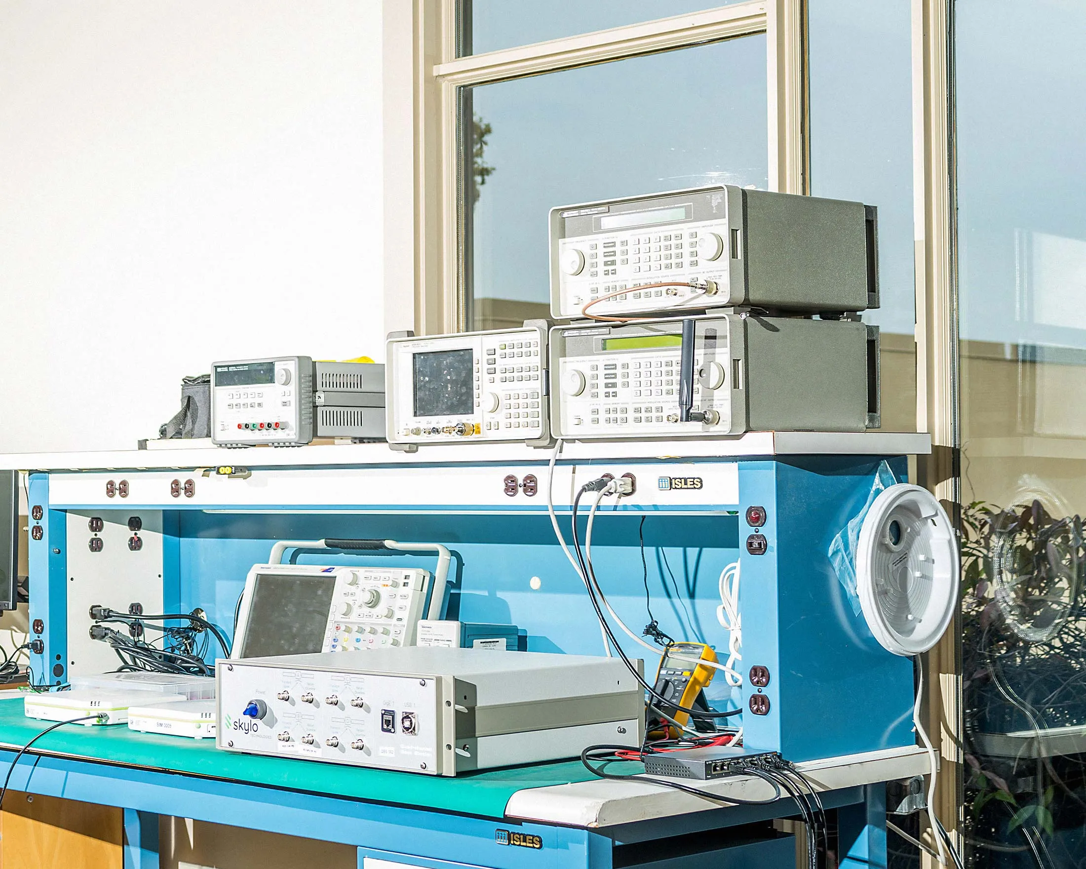 Signal analyzers waiting to be tested at Skylo’s lab in San Mateo.