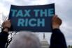 Demonstrators Protest Tax Breaks For Billionaires And Corporations At US Capitol