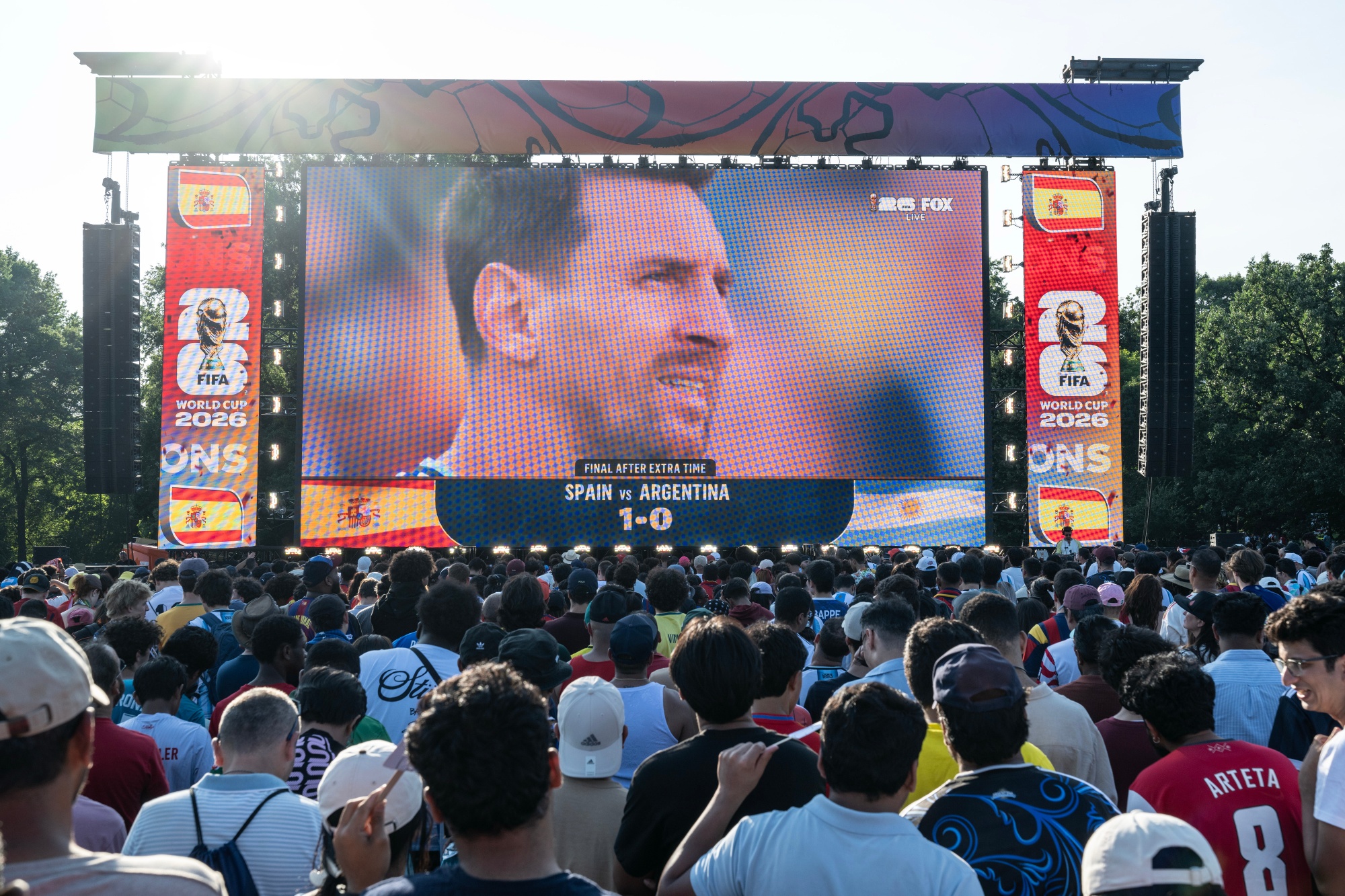 Lionel Messi on the big screen during a World Cup watch party in Central Park .