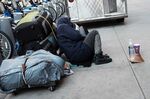 A homeless woman on the street in New York City.