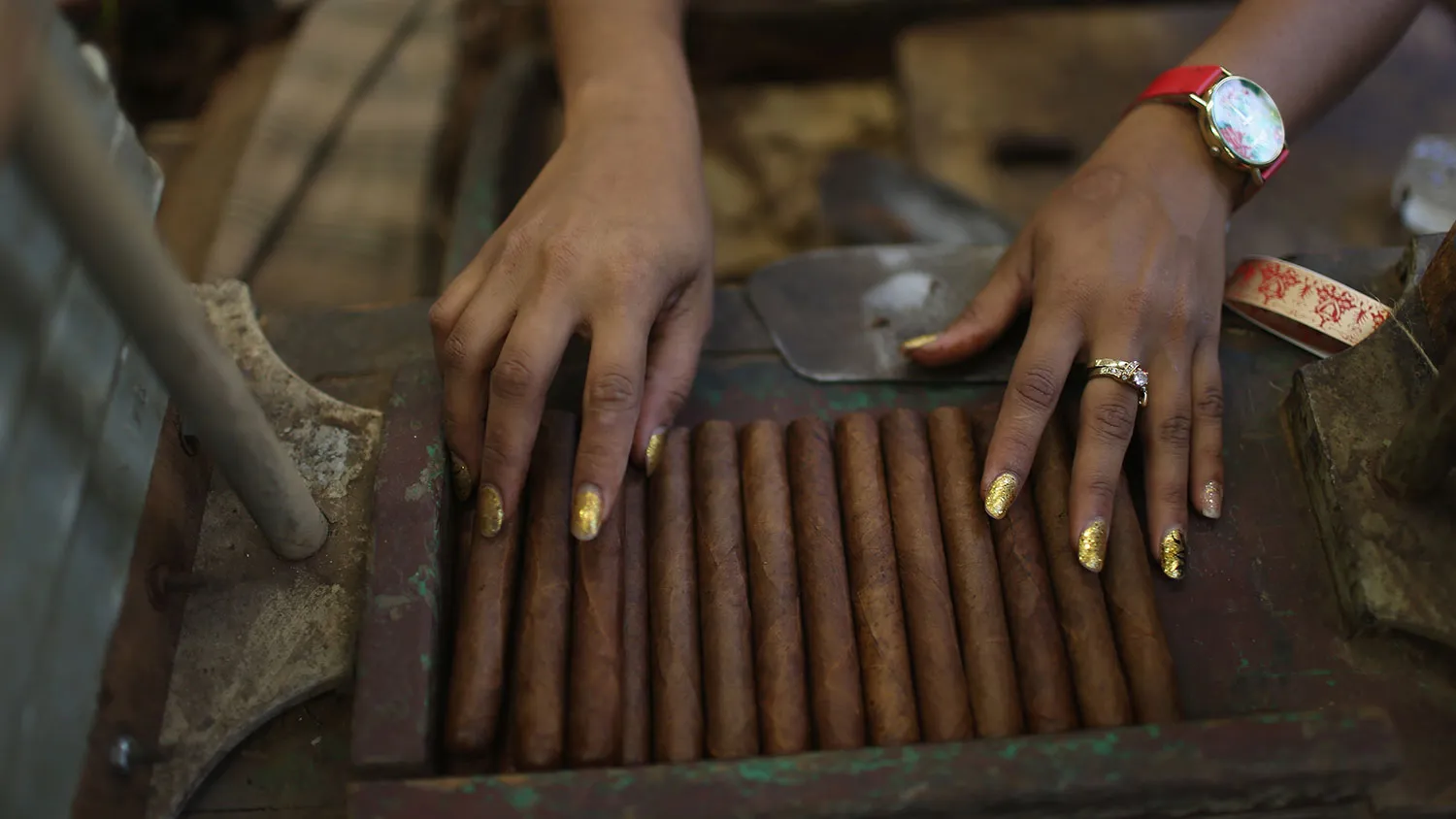 A worker rolls cigars at a cigar factory during the week-long International Habano Cigar Festival on Feb. 26, 2015 in Havana, Cuba.
