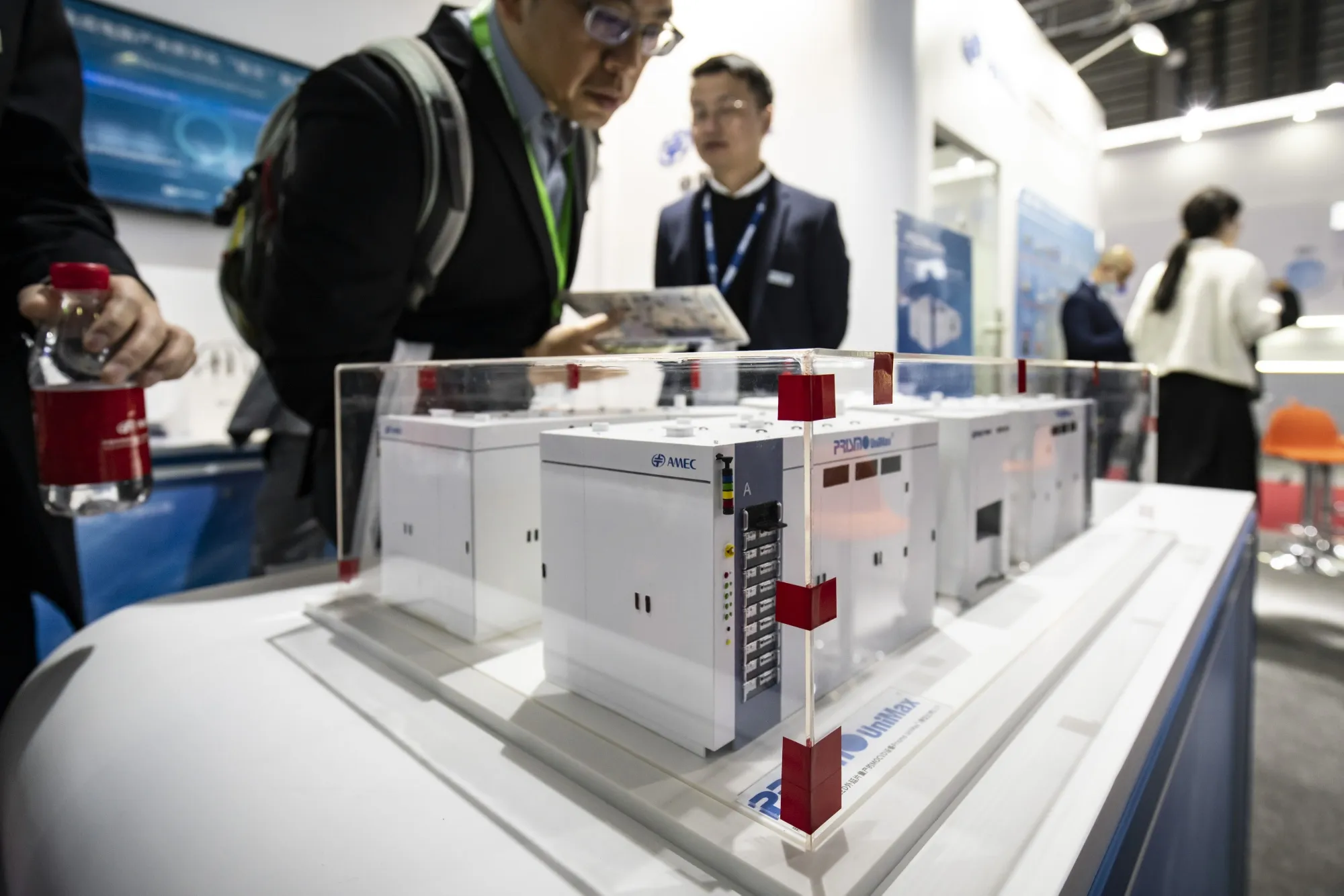 Models of products at the Advanced Micro-Fabrication Equipment (AMEC) booth at the Semicon China expo in March.
