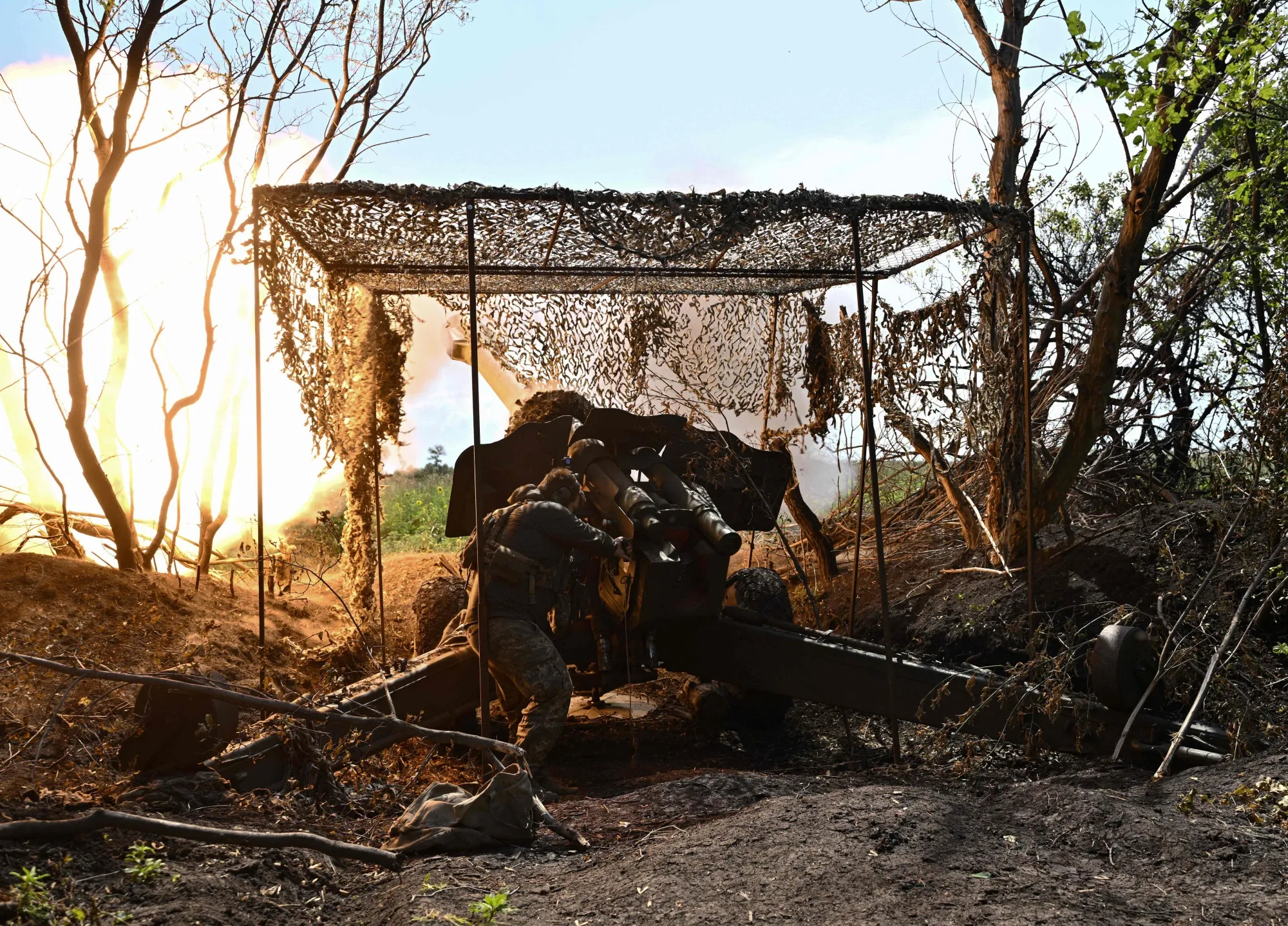 A Ukrainian artilleryman fires&nbsp;at Russian position near Bakhmut, Ukraine.