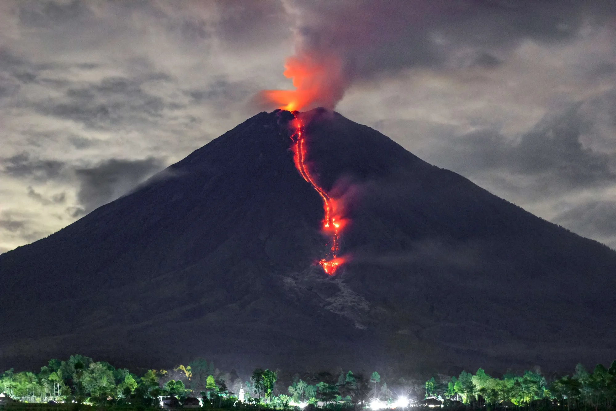 Lava flows during an eruption of Mount Semeru in East Java, Jan. 16.