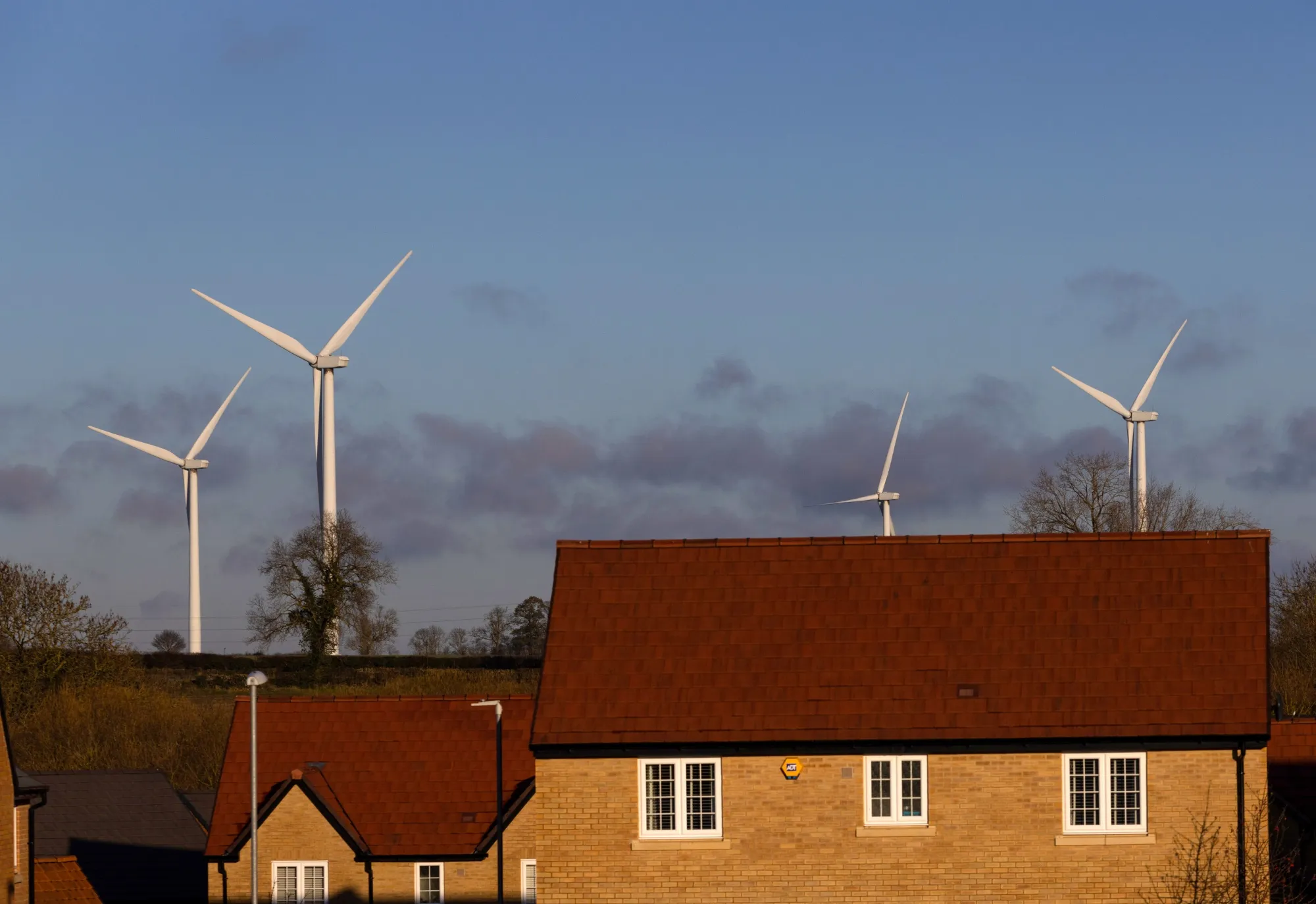 Wind turbines near residential houses near Burton Latimer.