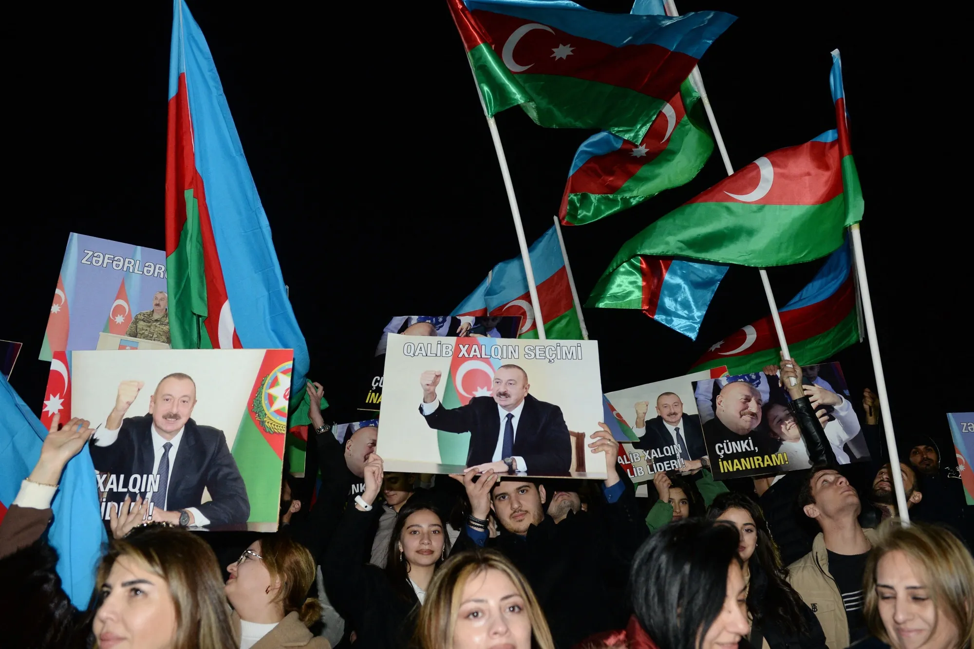 Ilham Aliyev supporters attend a rally after polls closed in a snap presidential election, in Baku, in February.