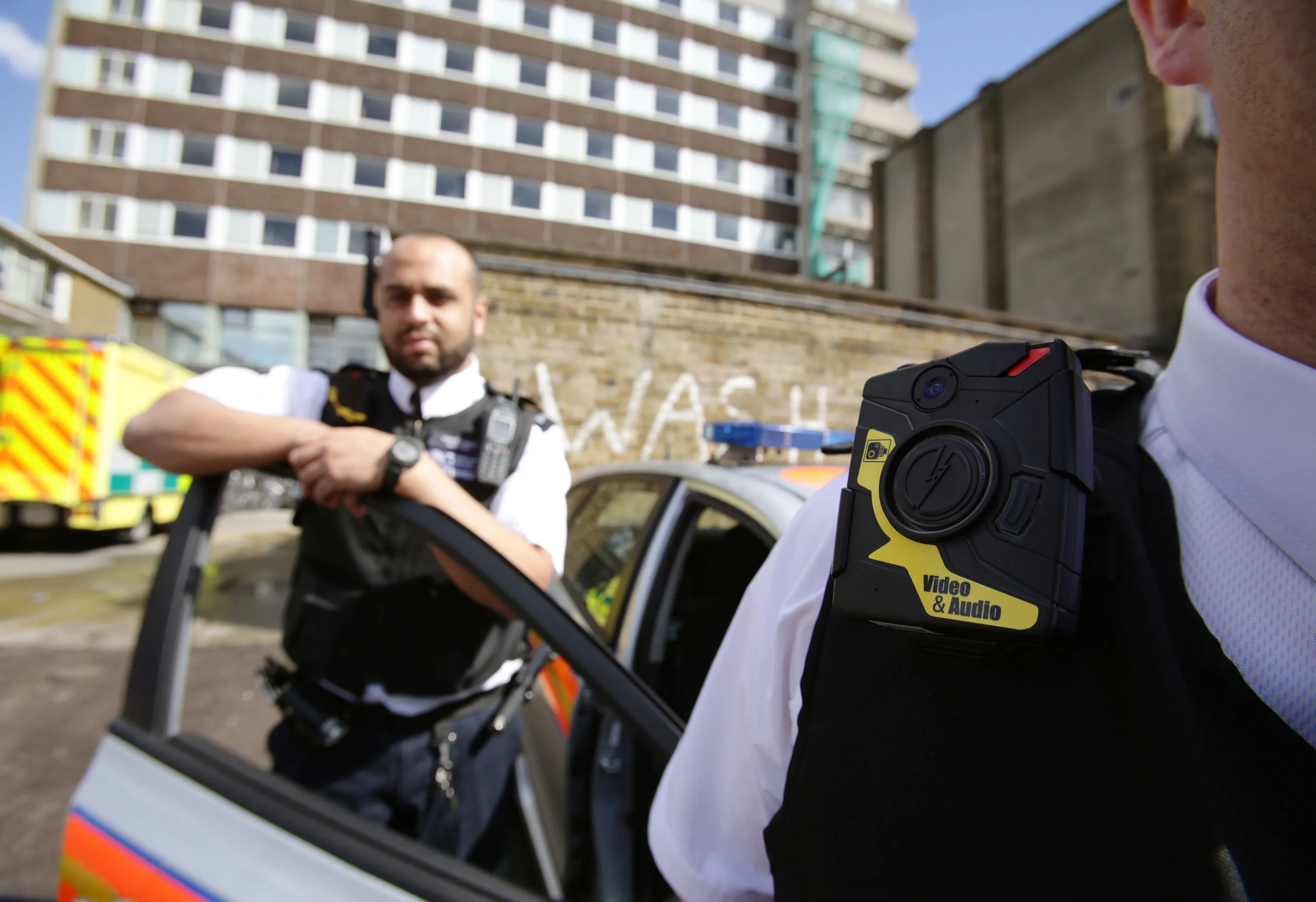 Metropolitan Police wear body-worn video cameras, ahead of a year-long pilot scheme in Kentish Town, London, on May 6, 2014. Photographer: Yui Mok - WPA Pool