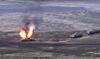 Armenian forces destroy Azerbaijani tank at the contact line of the self-proclaimed Republic of Nagorno-Karabakh, Azerbaija, Sept. 27.