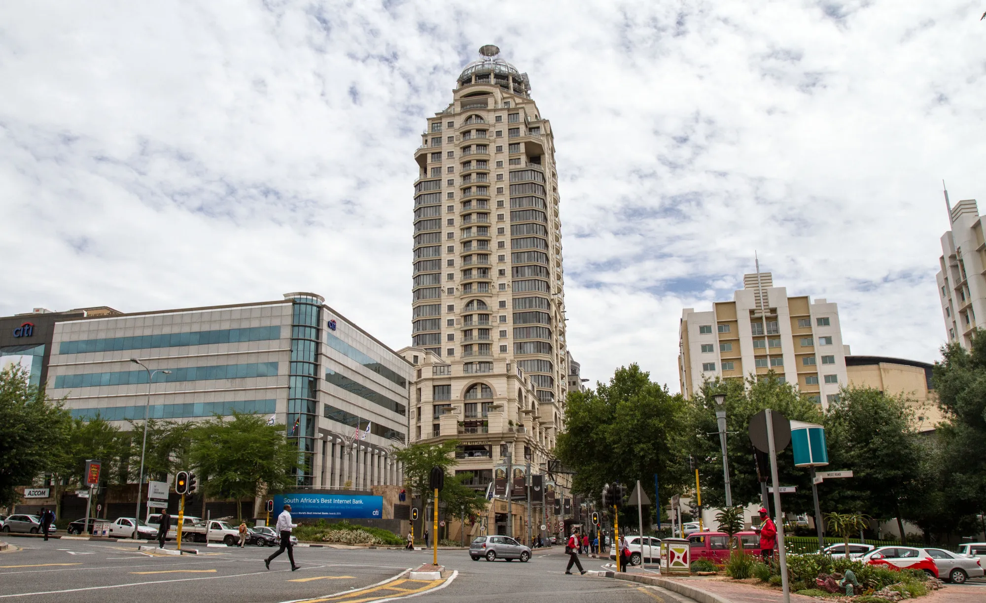 The offices of Citibank, operated by Citigroup Inc. stand, left, near the Michelangelo Hotel, center, in the Sandton district of Johannesburg, South Africa.