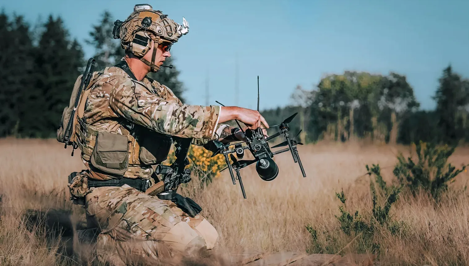 A soldier from the US Army’s 75th Ranger Regiment prepares a Neros Inc. Archer Strike drone for flight.