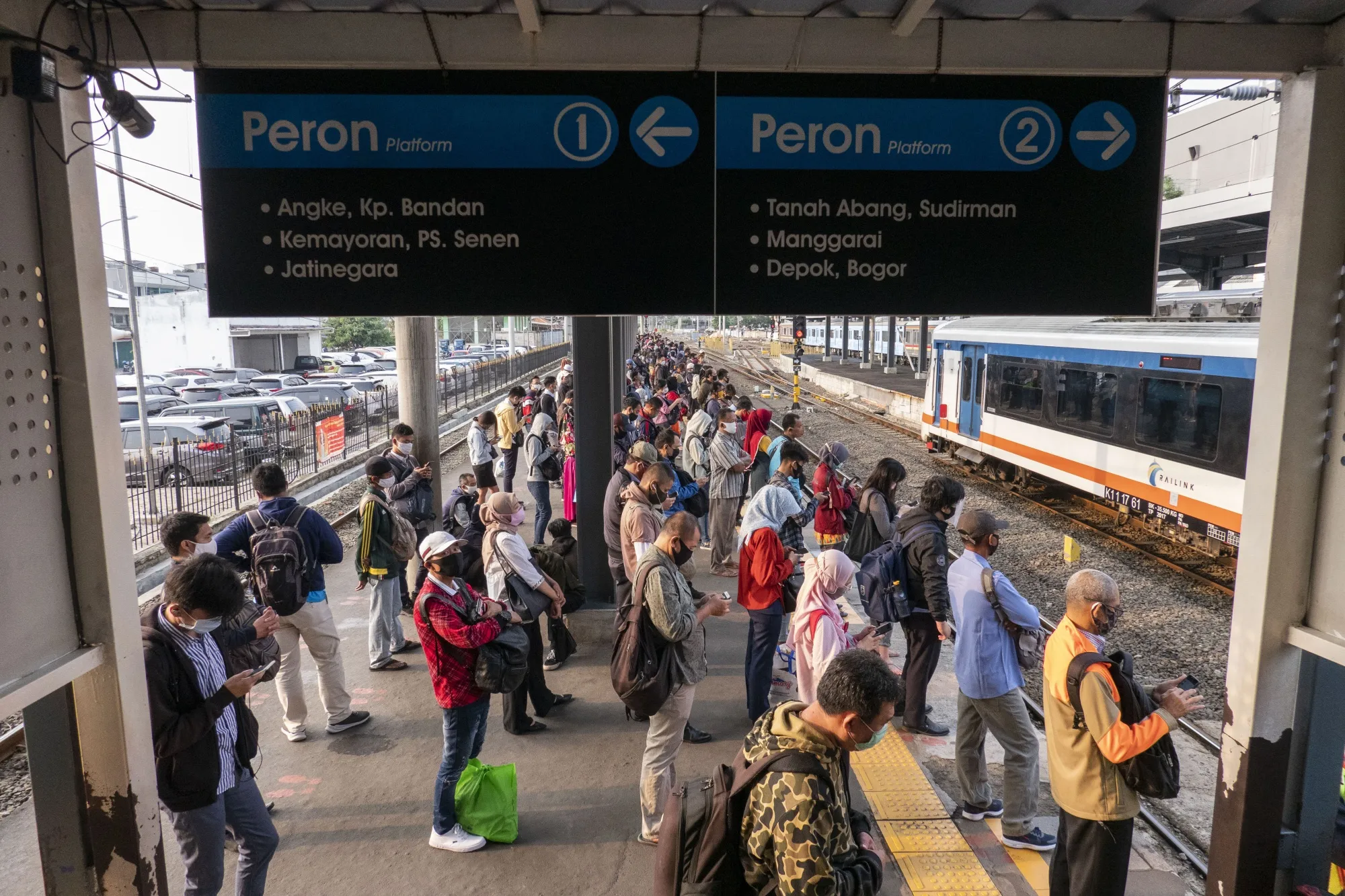 Morning commuters in Jakarta.