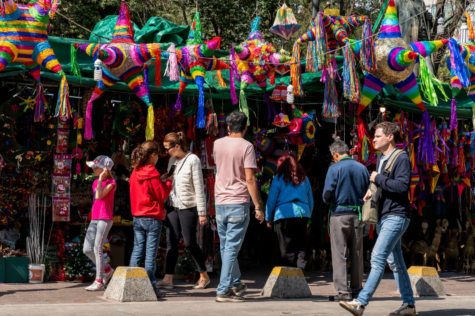 Shoppers at a street market in Mexico City.