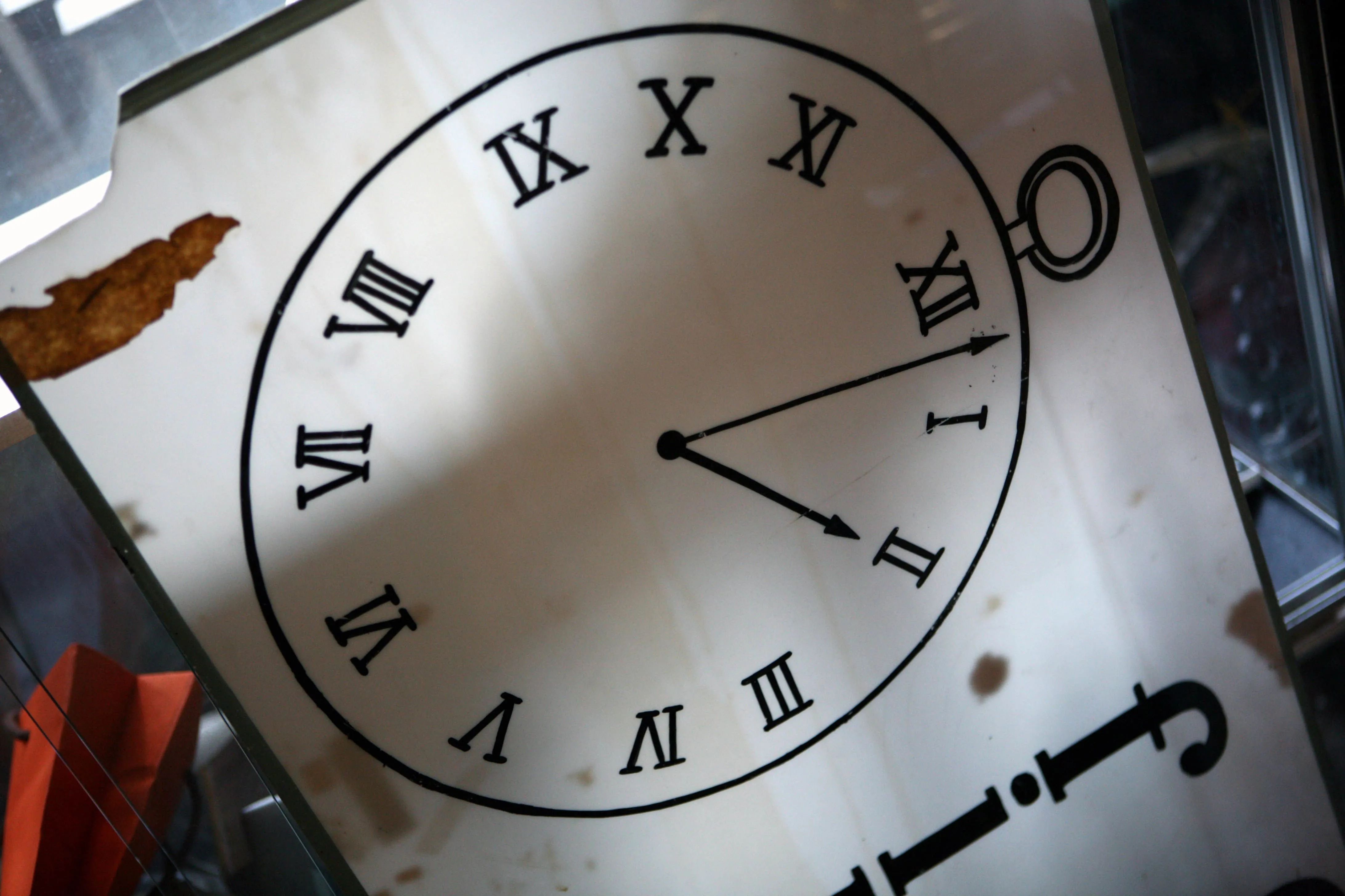 A "clocks repaired" sign sits in the Sutton Clock Shop in the Upper East Side neighborhood of New York, U.S., on Tuesday, Oct. 30, 2007. On Sunday, March 13, clocks spring forward one hour to daylight savings time.