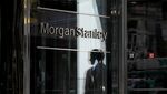 A pedestrian is reflected in the exterior of Morgan Stanley headquarters in New York.