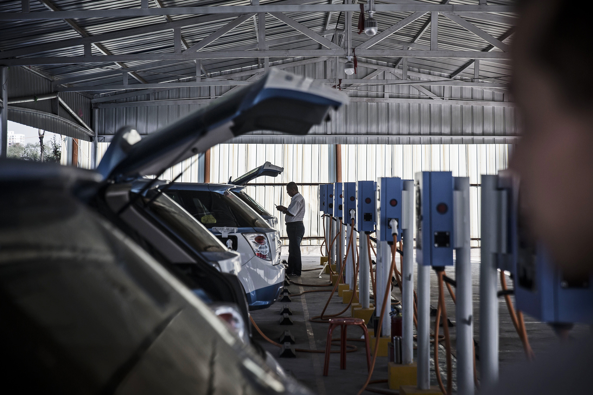Electric taxis charge in Taiyuan, Shanxi province, China.