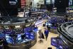 Traders work on the floor of the New York Stock Exchange