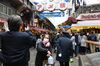 A shopper uses a hand sanitizing station at the Ameya Yokocho market in the Ueno district of Tokyo on Dec. 30.