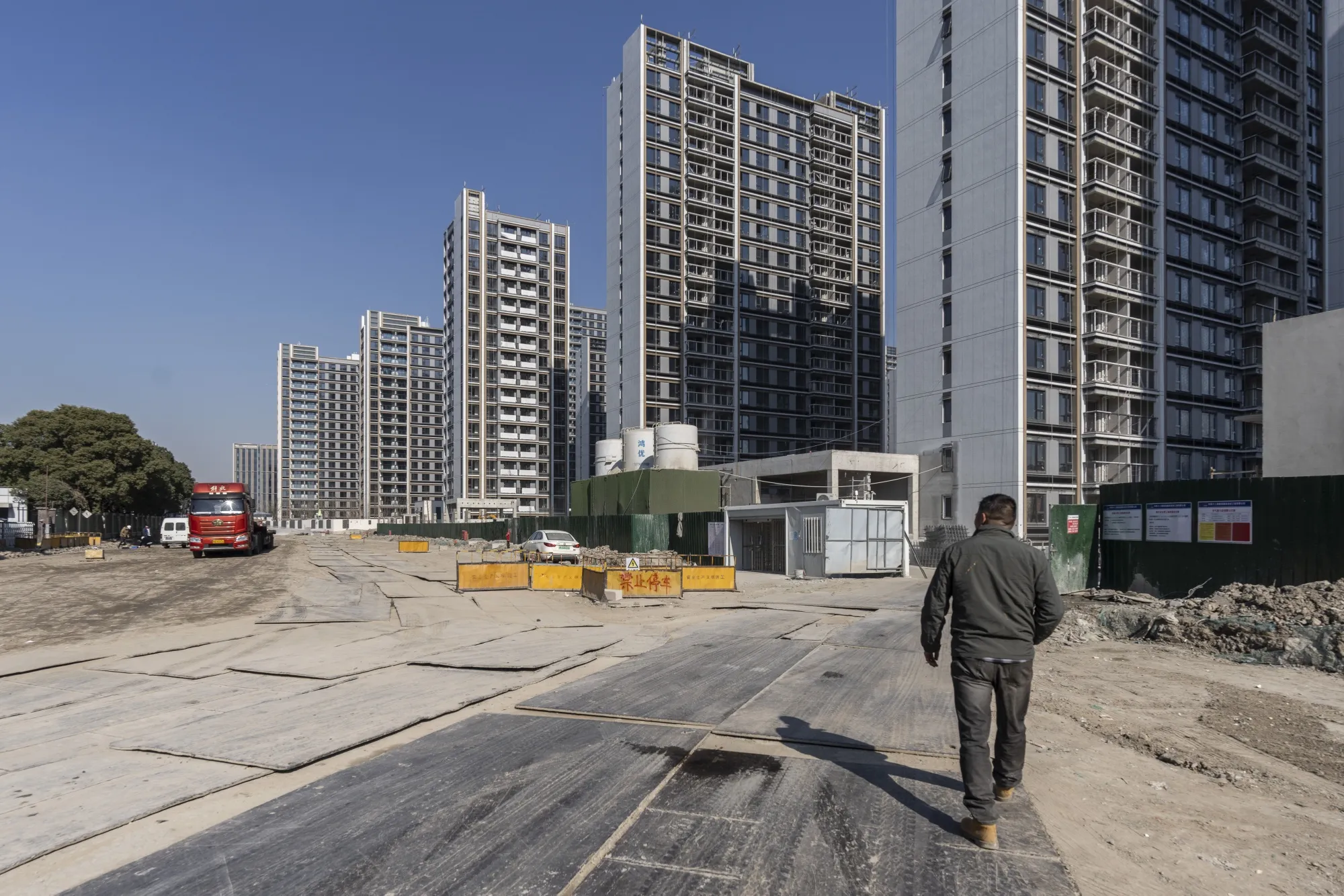 Residential buildings under construction at a China Vanke Co.&nbsp;development in Shanghai.