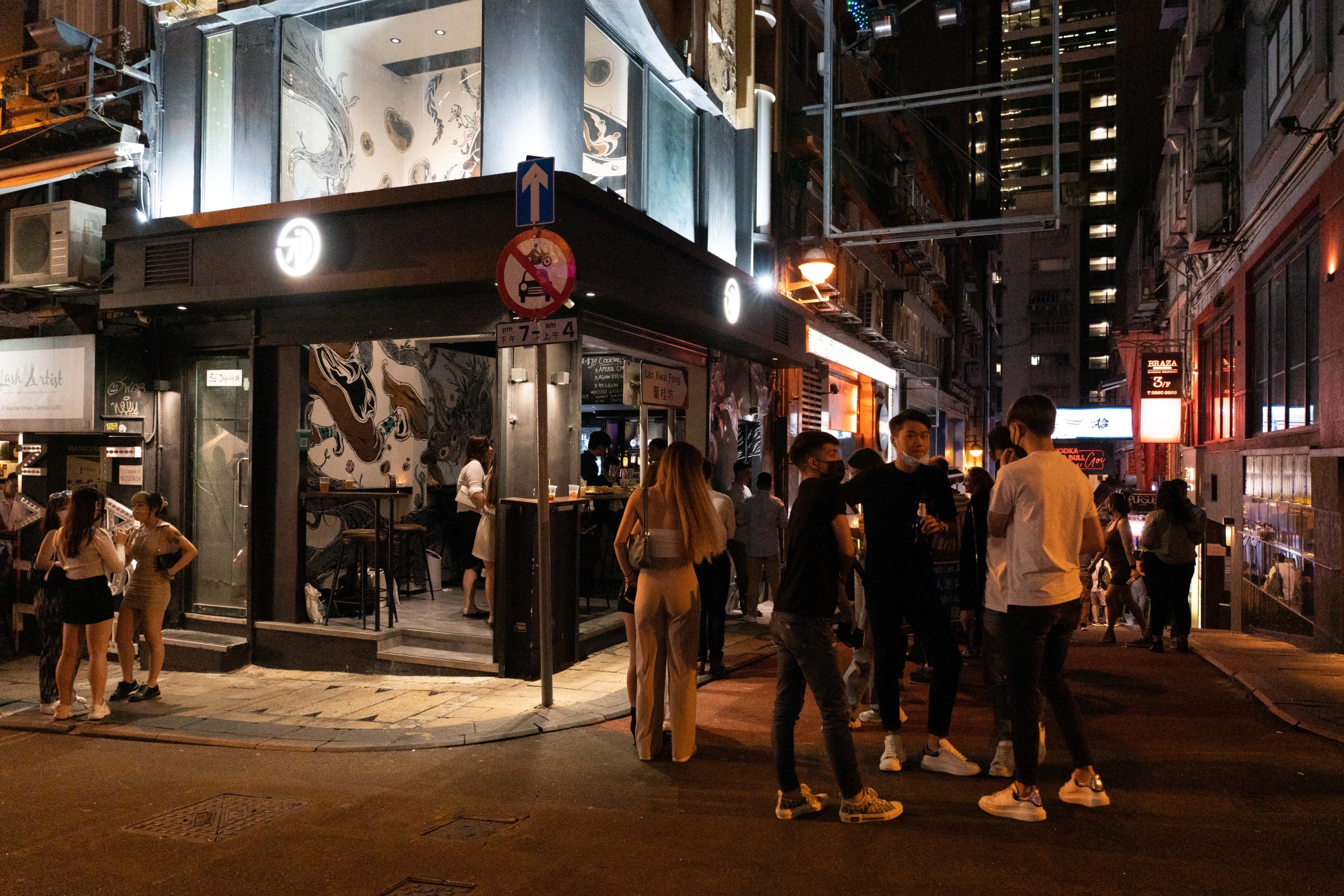 Customers in the Lan Kwai Fong nightlife area in Hong Kong.
