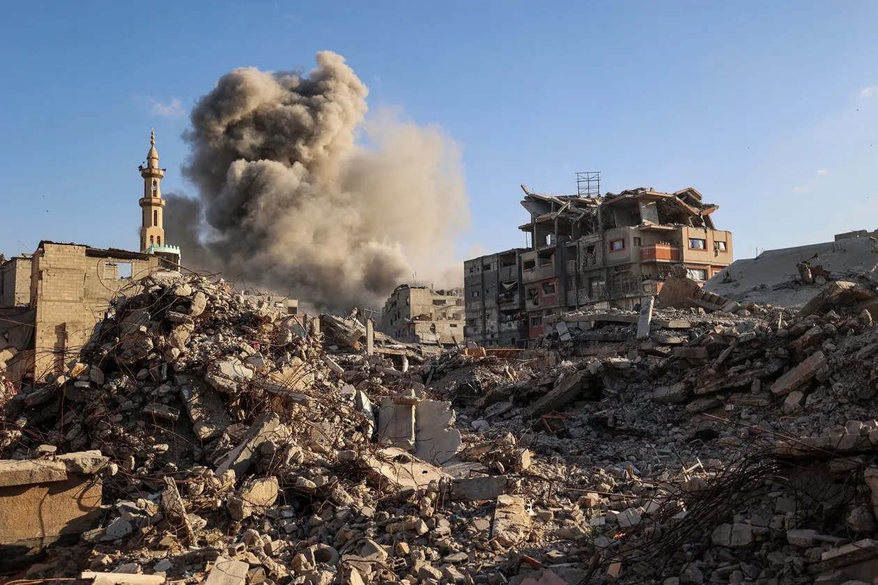 Smoke billows following an airstrike&nbsp;in the Bureij camp for Palestinian refugees in Gaza Strip on Oct. 19.&nbsp;