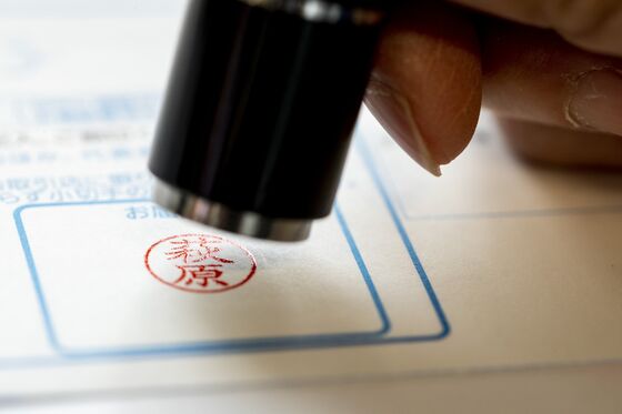 Virus Prompts Japan to Rethink Stamping Documents by Hand