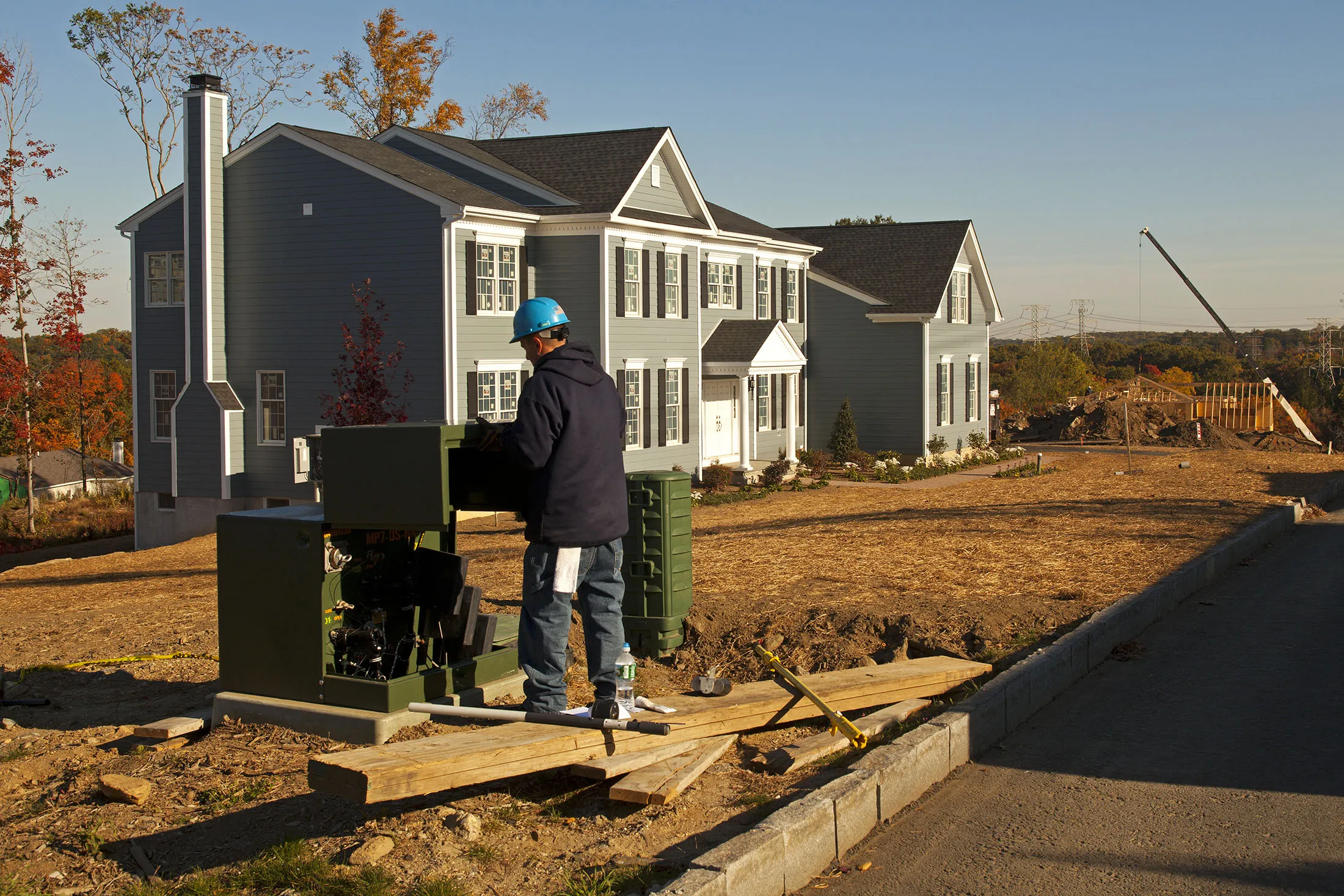 A&nbsp;worker installs&nbsp;electricity in a new housing development in Westchester County.&nbsp;