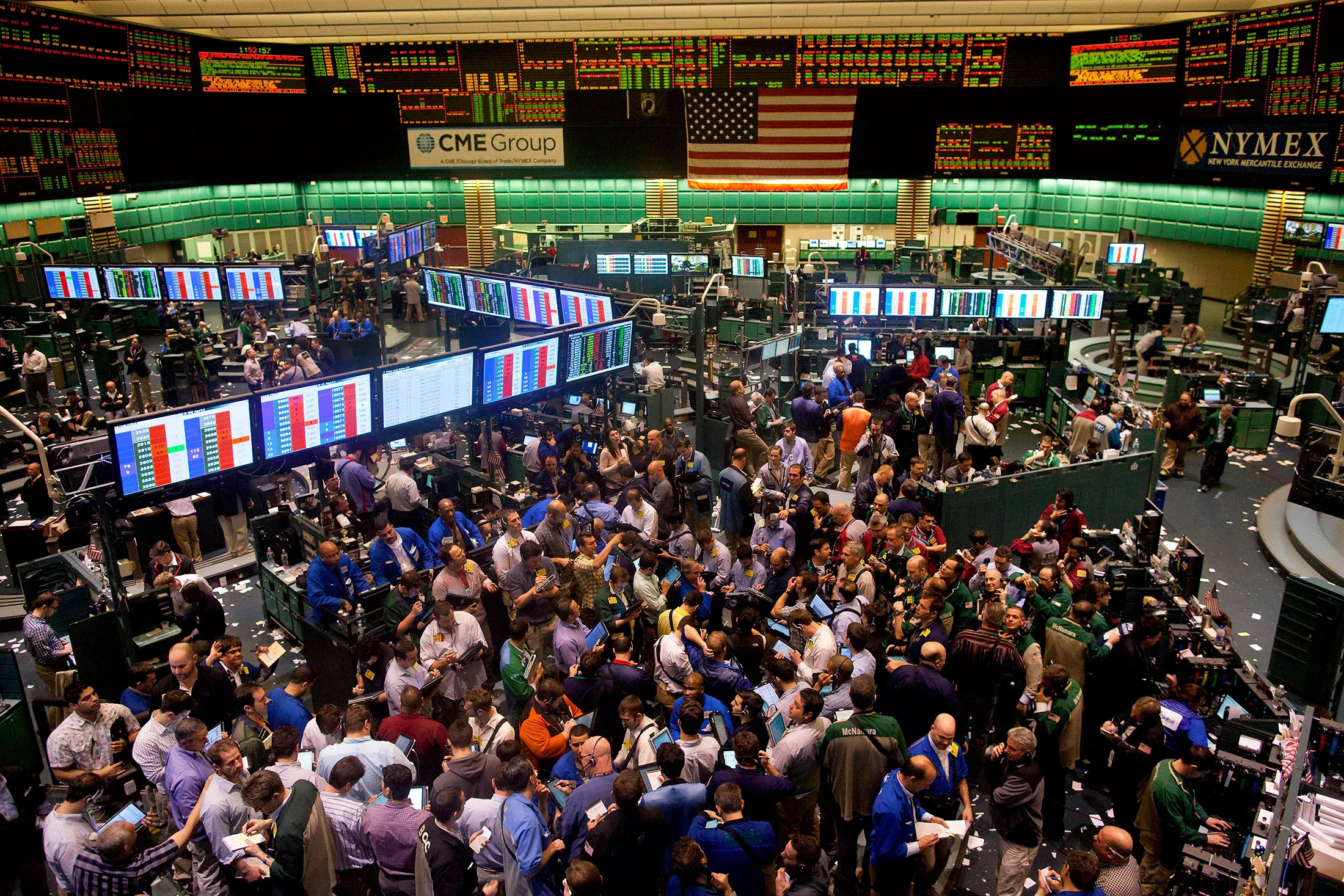 Traders work in the crude oil options pit at the New York Mercantile Exchange in New York, on Feb. 23, 2011.

