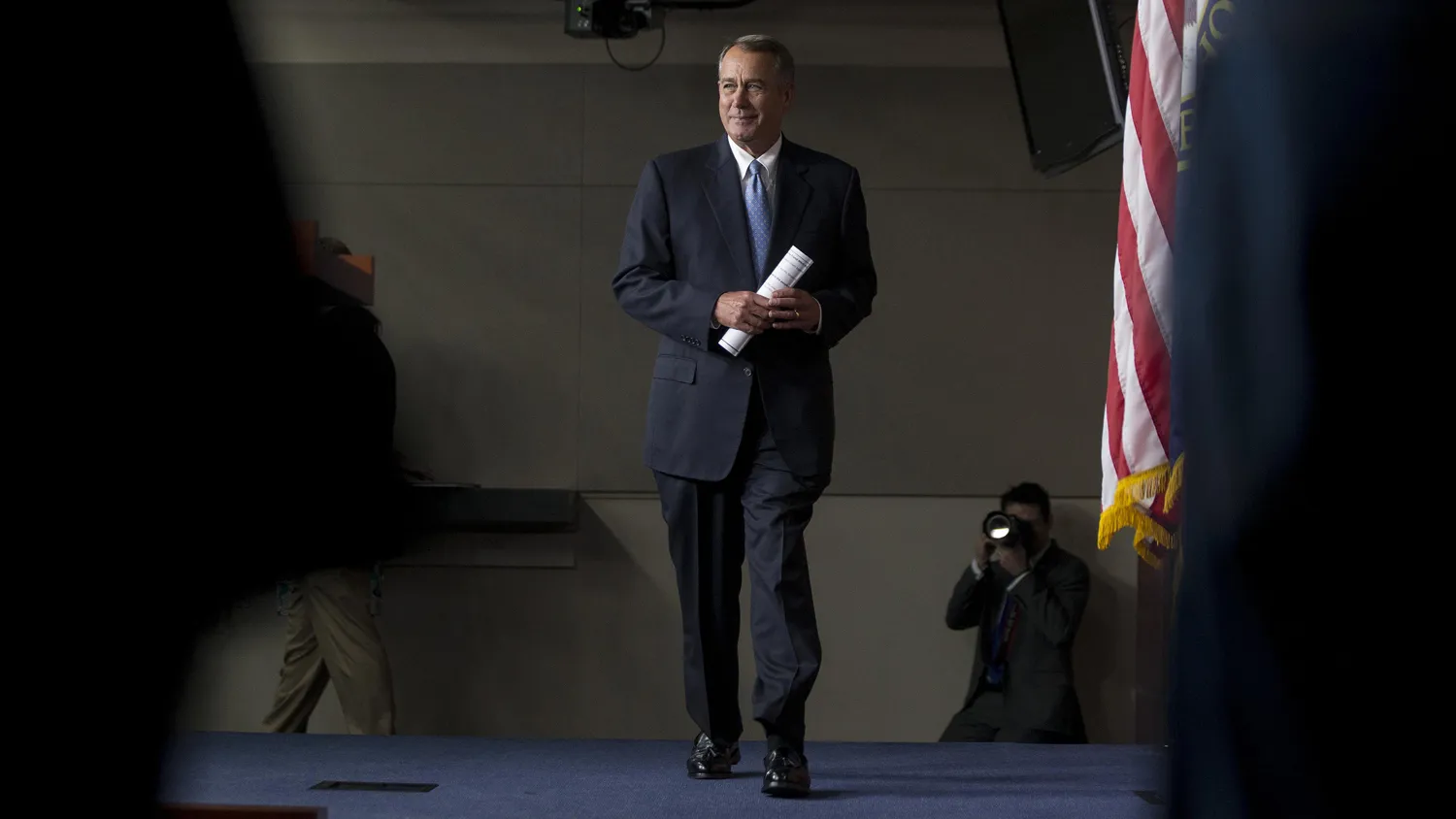 House Speaker John Boehner, a Republican from Ohio, smiles while arriving to a news conference in Washington on Nov. 6, 2014, after his party won at least 245 House of Representatives seats in that week's elections, giving Republicans their largest majority since World War II.
