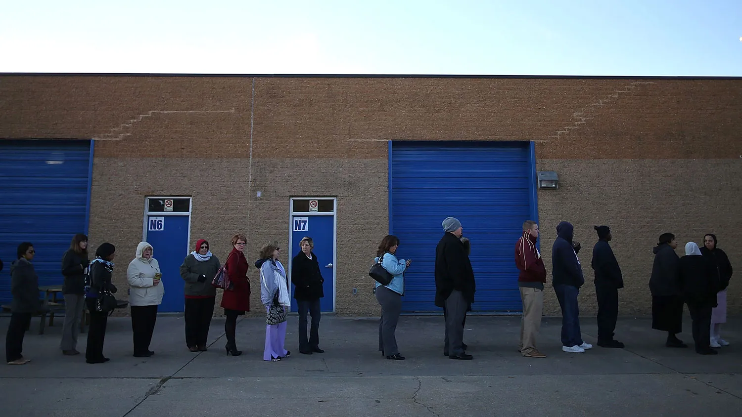 People wait in line to vote at the Caroline High School polling station, on November 6, 2012 in Milford, Virginia.
