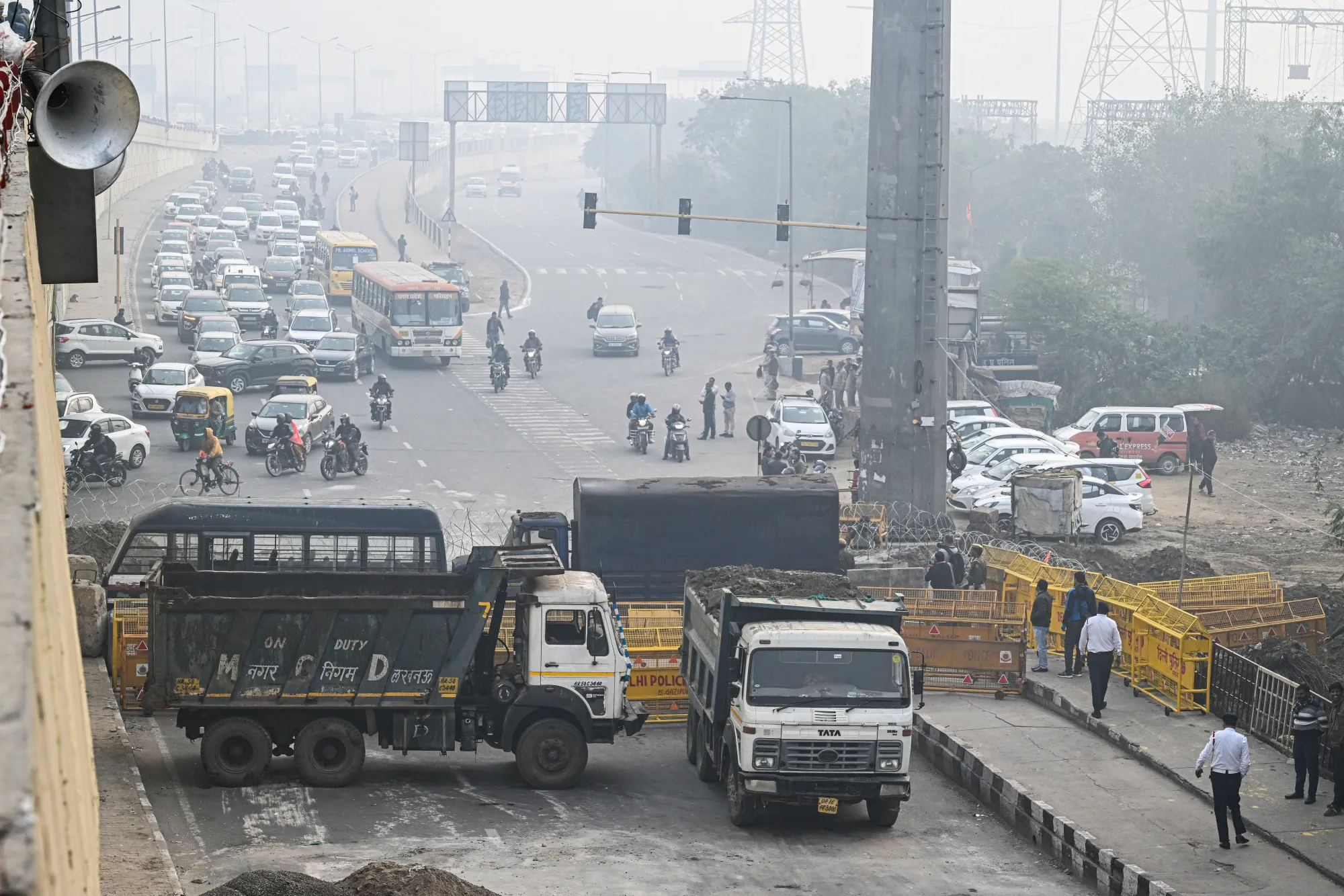 Police in Delhi and surrounding states laid metal barriers, concrete barricades and barbed wire across roads as the protesting farmers approached the capital.&nbsp;