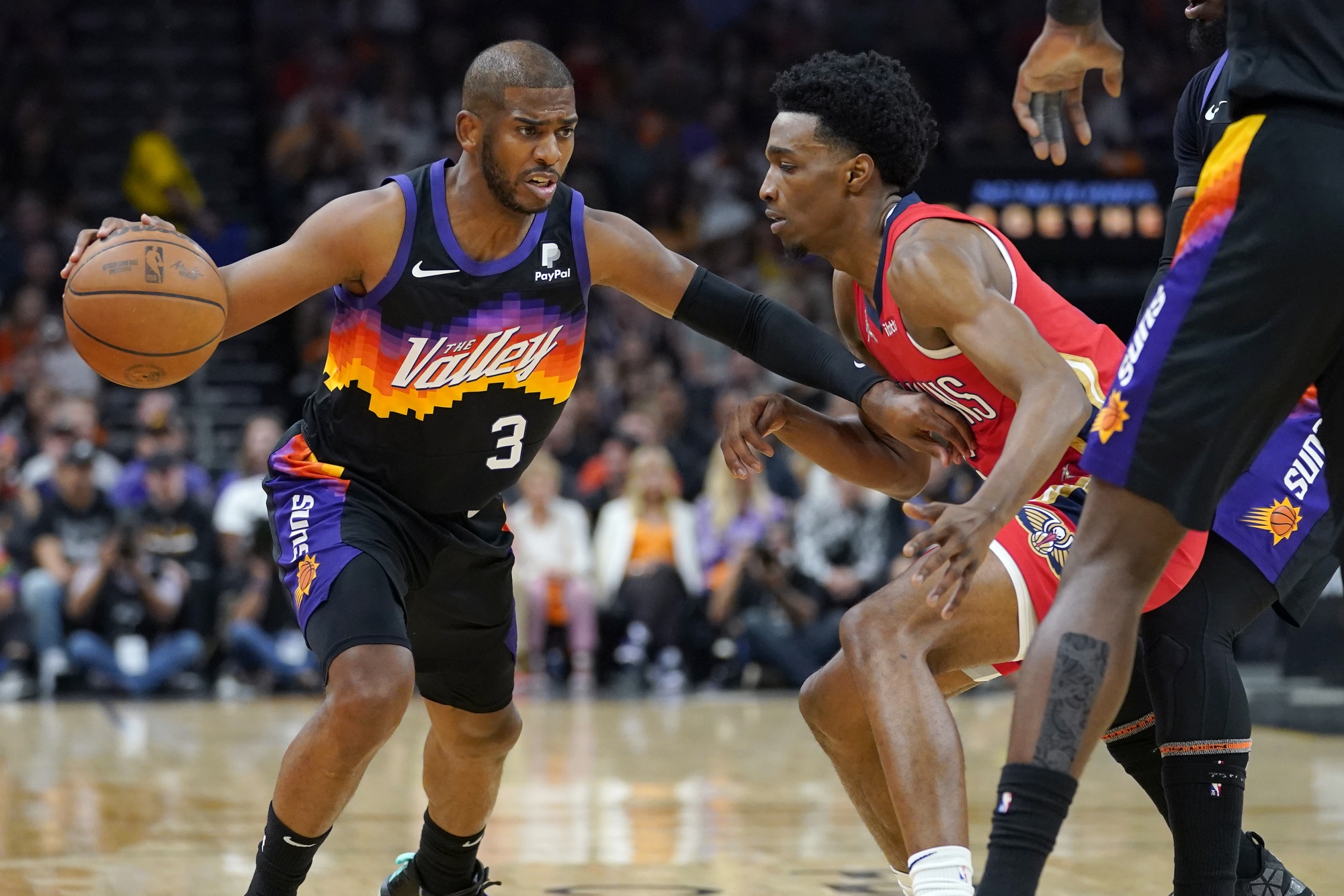 Chris Paul of the Phoenix Suns dribbles the ball against the Dallas