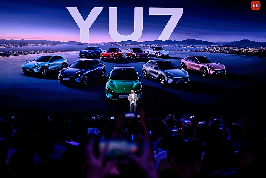 Lei Jun introduces the Xiaomi YU7 during a launch event in Beijing on June 26.