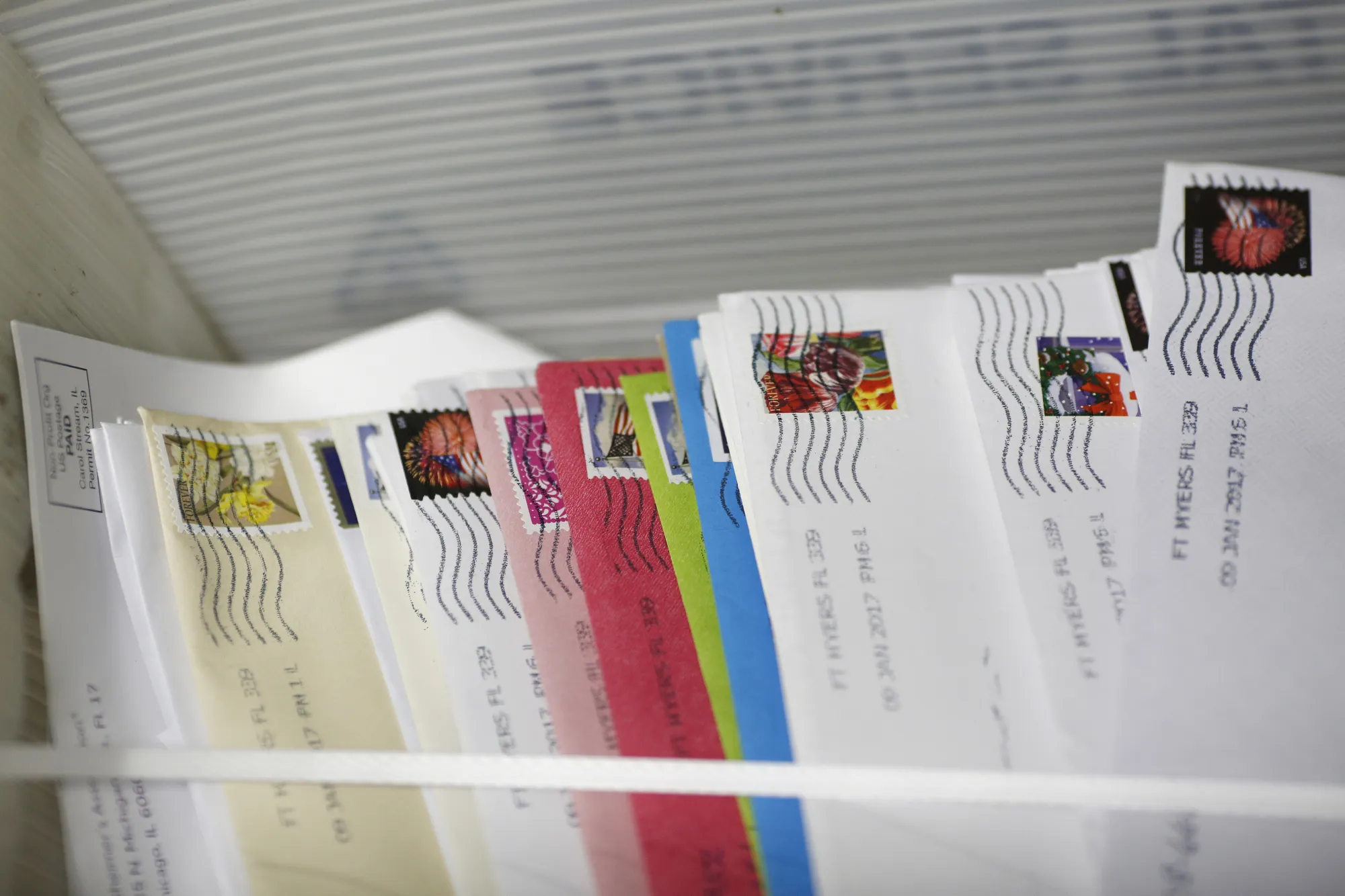 Postage stamps on mail inside a United States Postal Service (USPS) sorting center in Louisville, Kentucky.