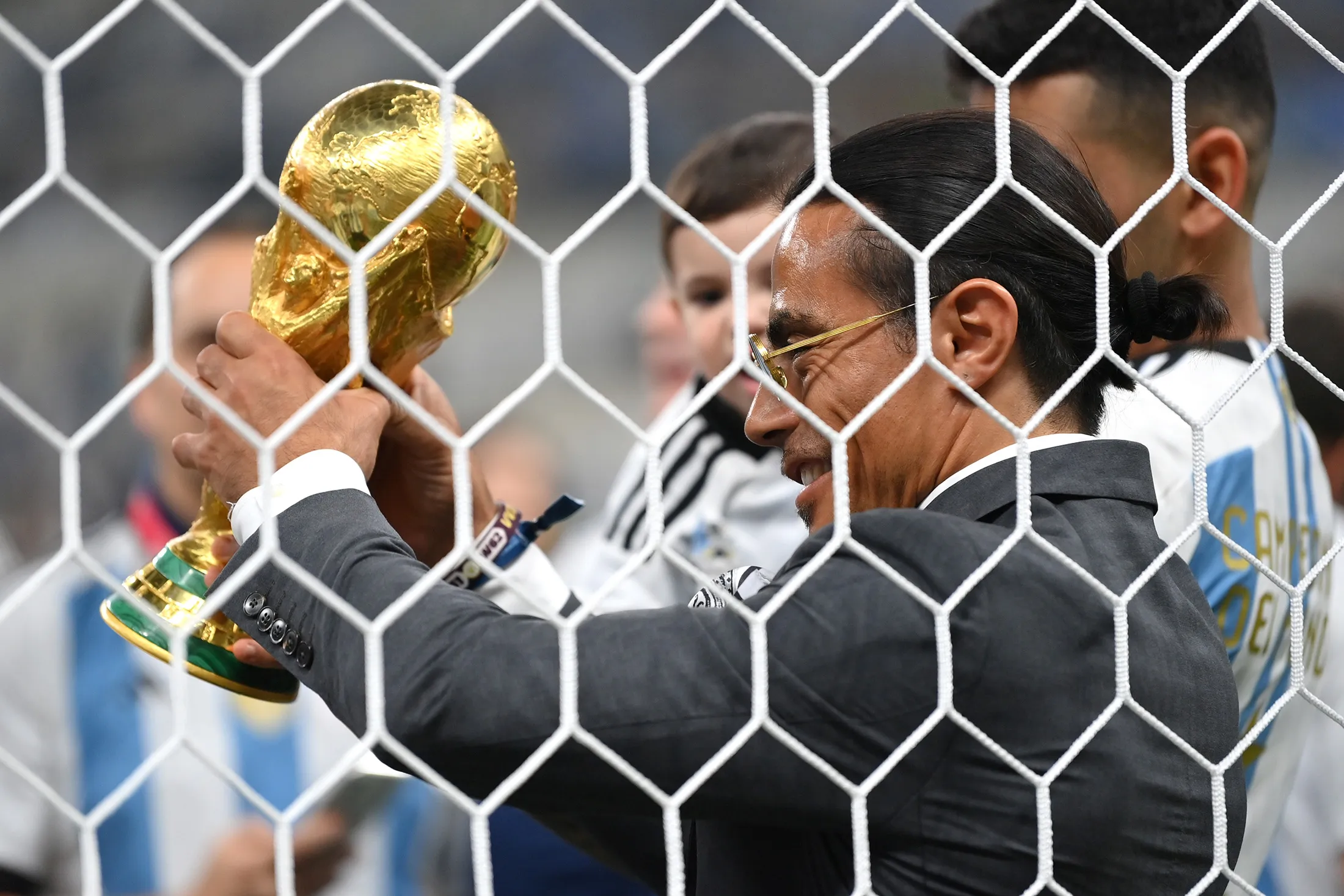 Nusret Goekce, also known as Salt Bae, holds the FIFA World Cup Qatar 2022 Winner's Trophy&nbsp;on Dec. 18.