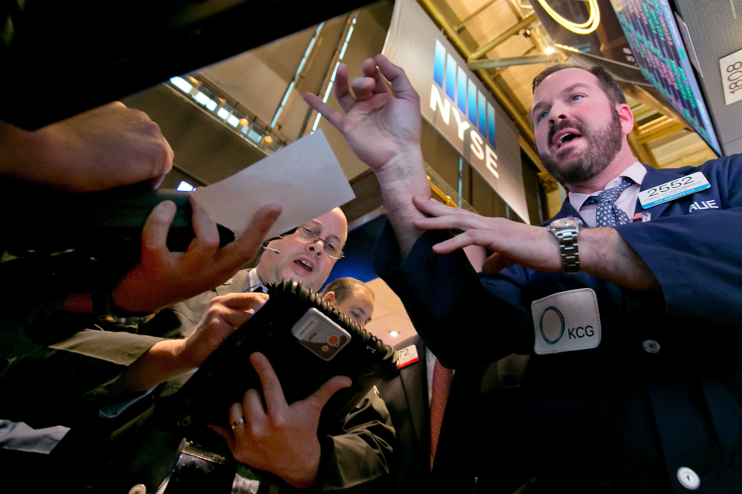 Traders on the floor of the New York Stock Exchange.
