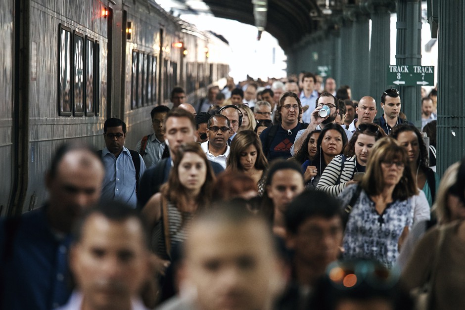 Commuters flood out of a Hoboken Terminal platform on the first day of the &quot;summer of hell.&quot;