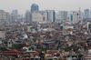 Residential and commercial property stand on the city skyline in Hanoi, Vietnam, on Monday, Feb. 25, 2019. President Donald Trump and North Korean leader Kim Jong Un might declare a formal end to the Korean War during their summit this week, South Korea said, as the U.S. leader played down the prospects of giving Pyongyang sanctions relief.