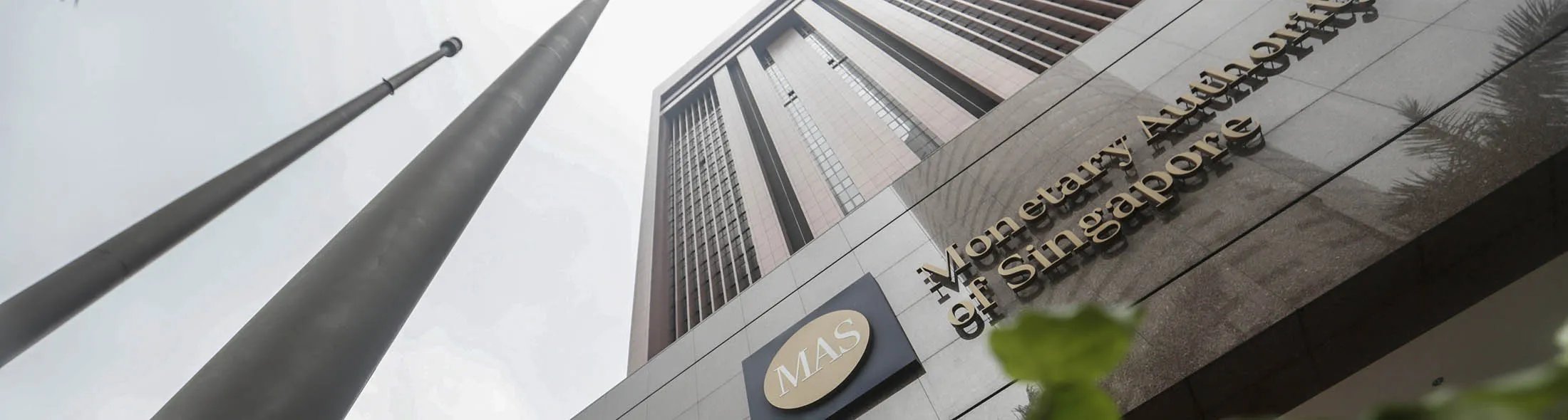epa05325950 (FILE) A file picture dated 30 July 2014 shows an exterior view of the Monetary Authority of Singapore (MAS) in Singapore. According to media reports on 24 May 2016, MAS ordered the closure of Switzerland's BSI Bank in Singapore. BSI Bank, a merchant bank operating in the country since 2005, has been ordered to shut down amid a probe related to Malaysia's state fund 1MDB (1Malaysia Development Berhad). It is the first time in 32 years that Singapore is withdrawing a license from a merchant bank. EPA/WALLACE WOON
