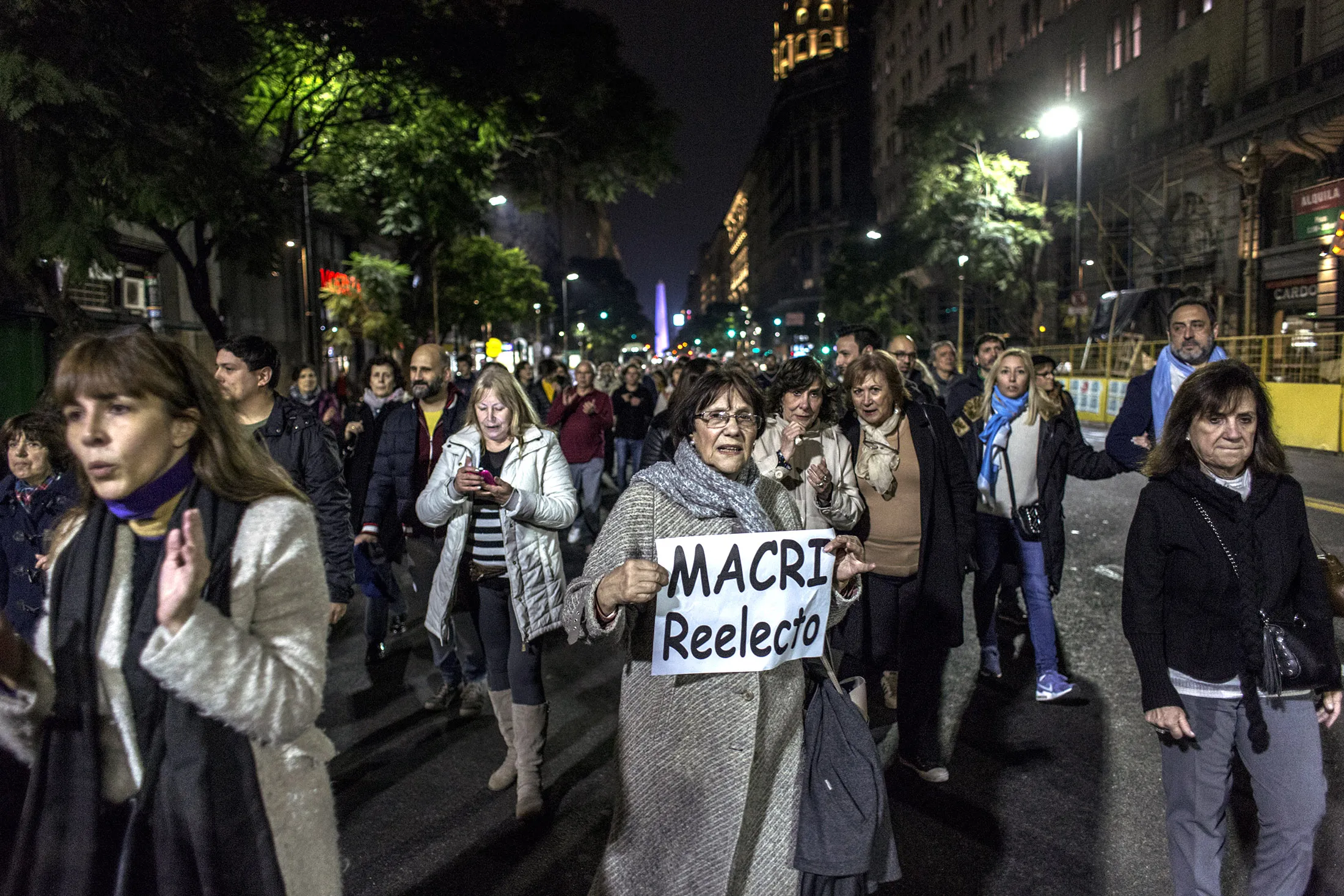 Demonstrators gather during a rally in support of President Mauricio Macri on Friday, Aug. 16.